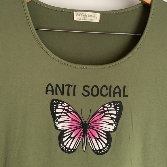 We have a pretty green dress. Super stretchy. Has a butterfly on the front 🦋 - Picture 3 of 3